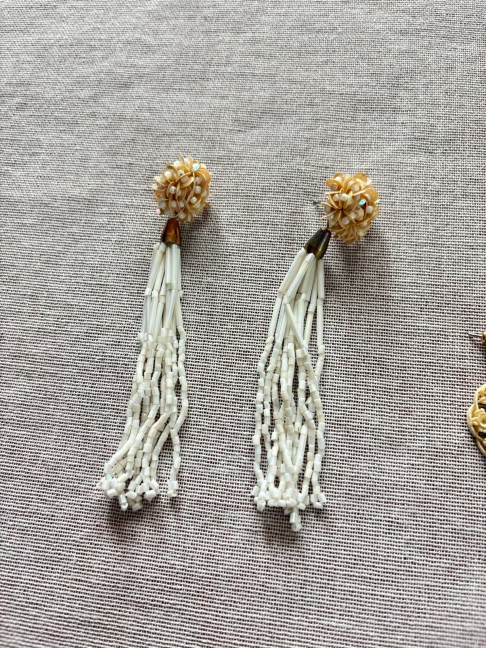 Set of three vintage cream earrings.