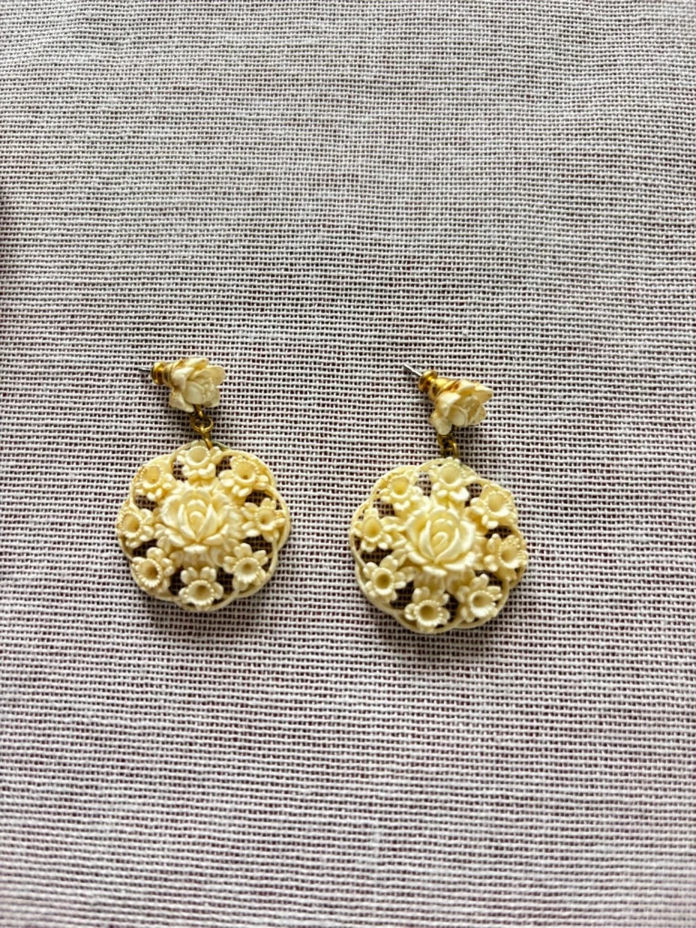 Set of three vintage cream earrings.