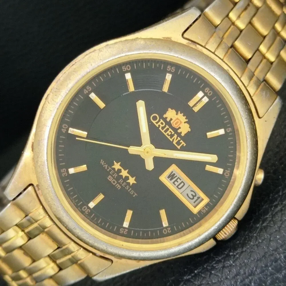 Vintage 1972 Orient Automatic Mens Gold Watch W/daydate & Black accents