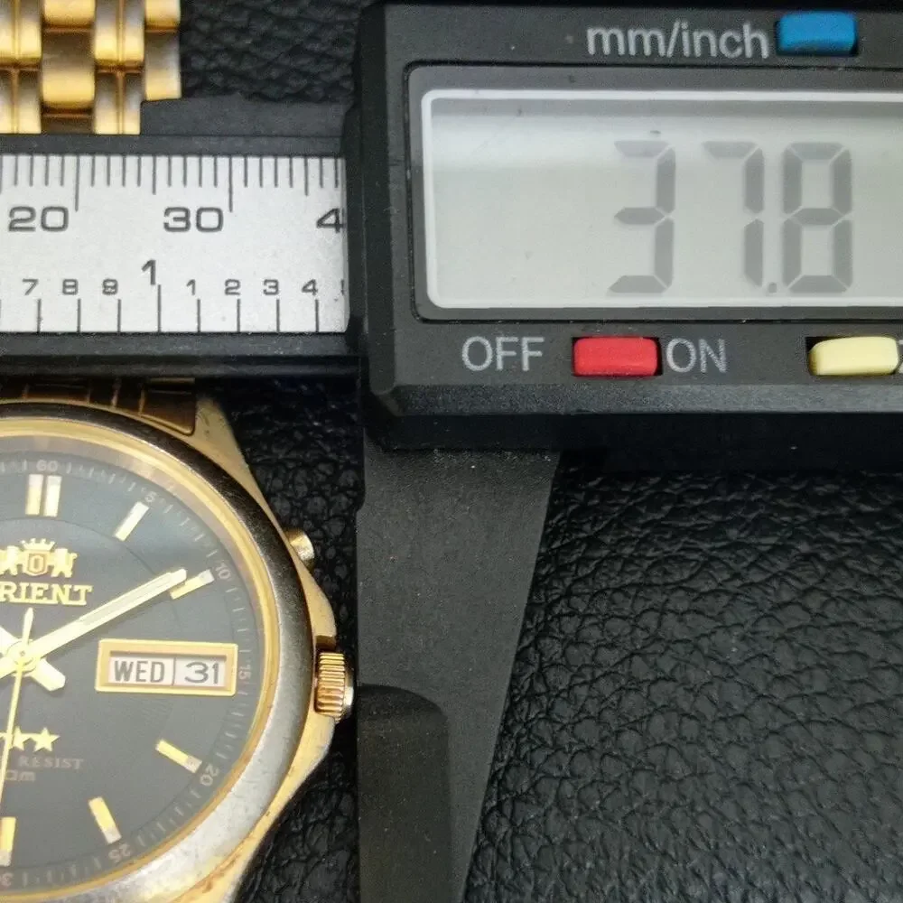 Vintage 1972 Orient Automatic Mens Gold Watch W/daydate & Black accents