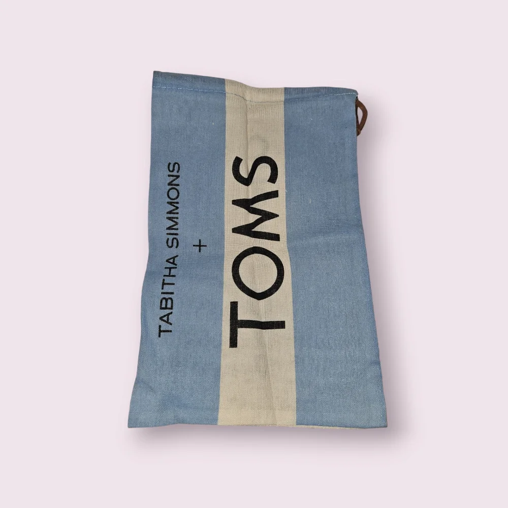 Toms tag black blessed