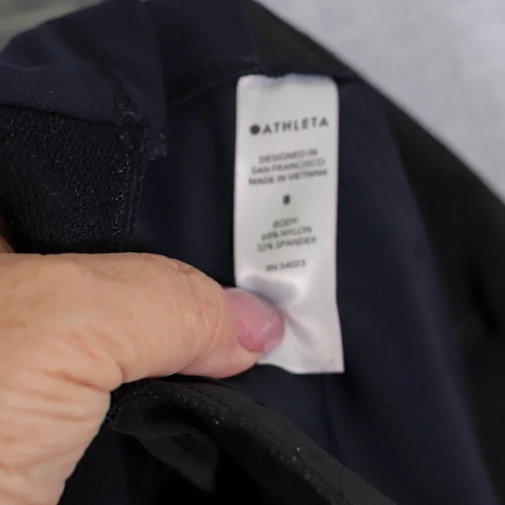 Athleta Size 8 dark blue Cosmic Bermuda stretch zip pockets shorts no size tag