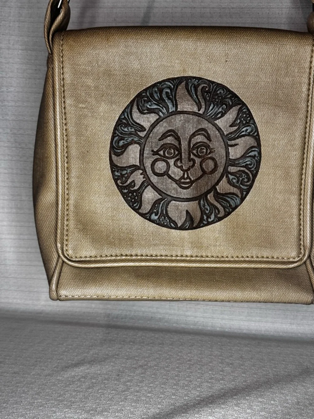 Metallic Gold Crossbody Bag with Sun Medallion