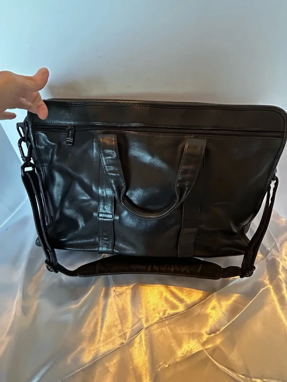Tumi black leather