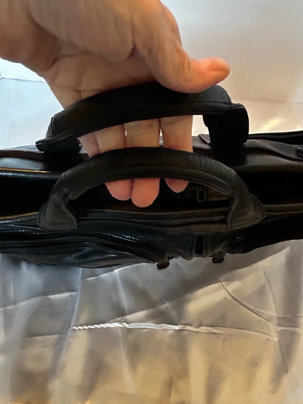 Tumi black leather