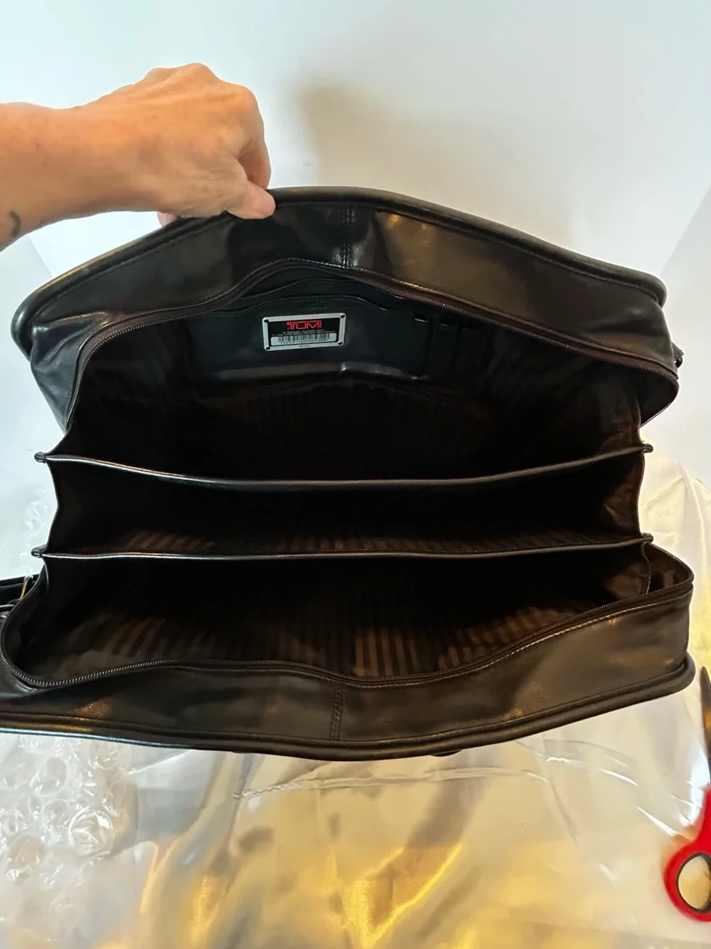 Tumi black leather
