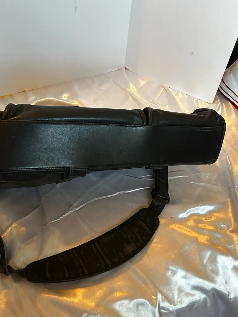 Tumi black leather