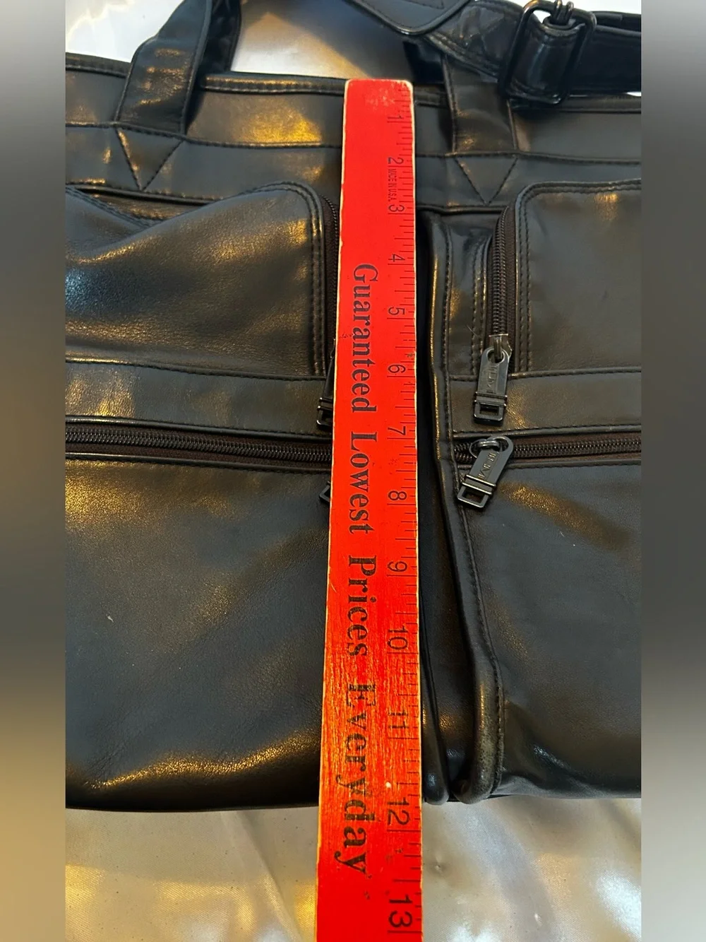 Tumi black leather
