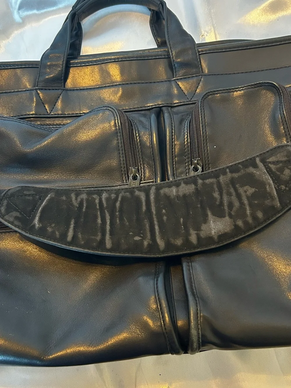 Tumi black leather