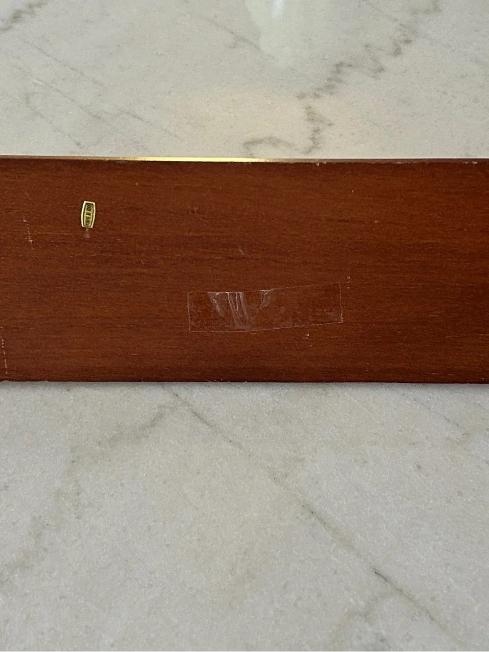 Vintage Wall-Mounted Tie Rack with Gold Hooks and Black Accent