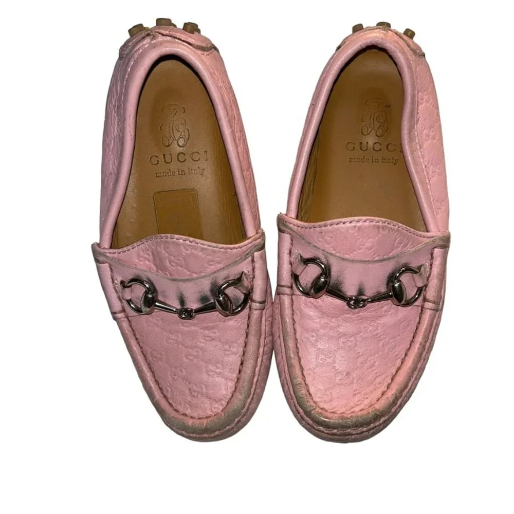 Gucci logo pale