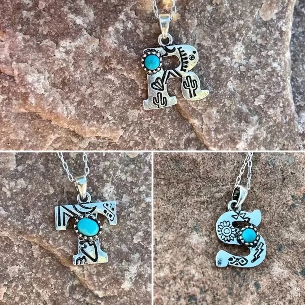 N/A new turquoise letter