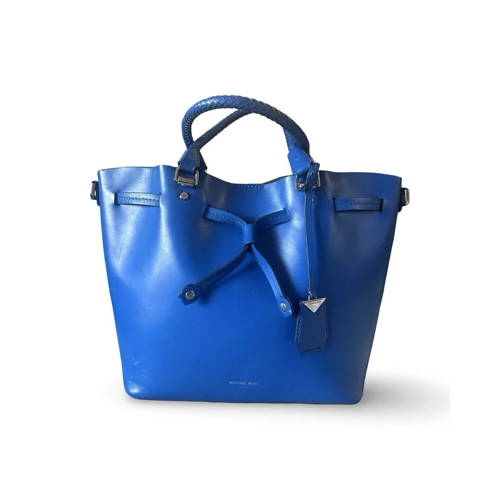 Michael Kors owned or left