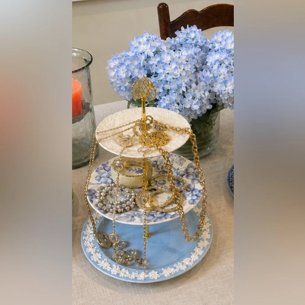 Handmade jewelry display or dessert display made out of vintage plates