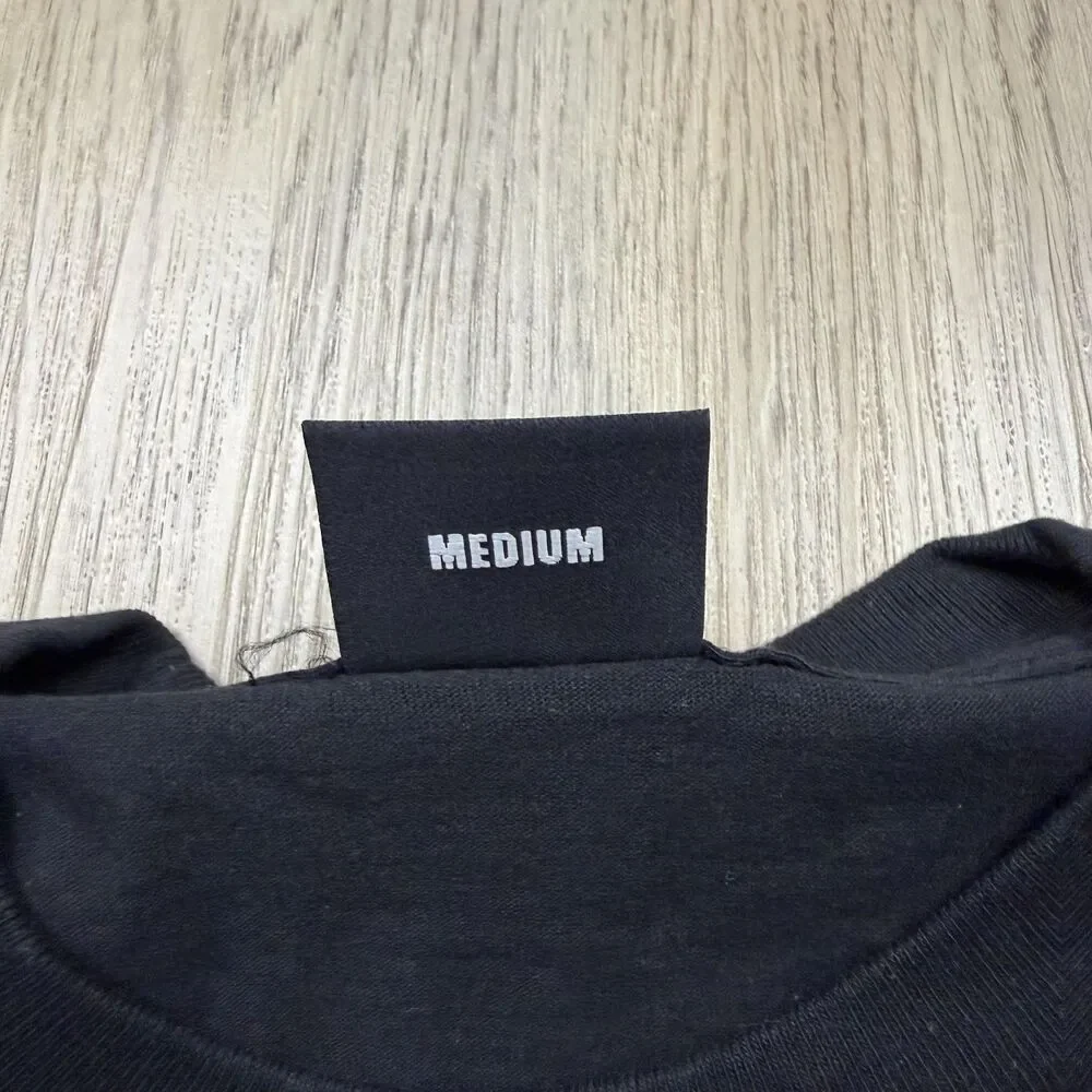 Revenge Clothing back reads
