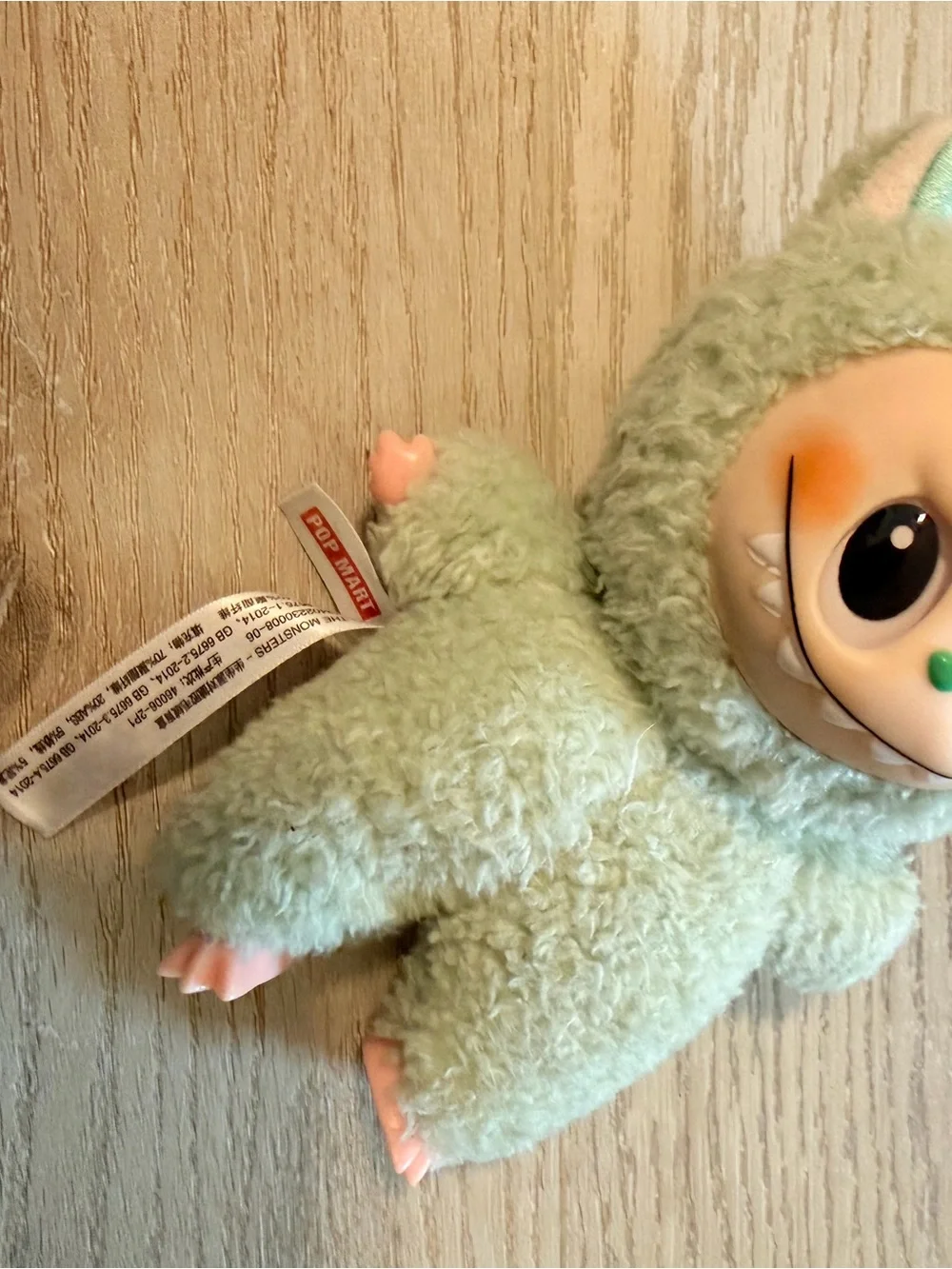 Pop Mart Labubu The Monsters keychain in Green Grape