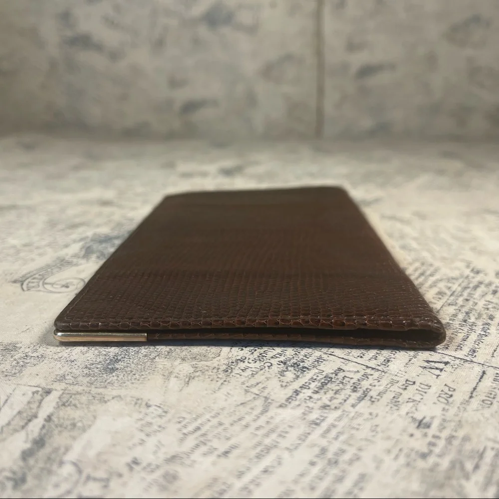 Smythson Antique lizard skin passport wallet with gold corners