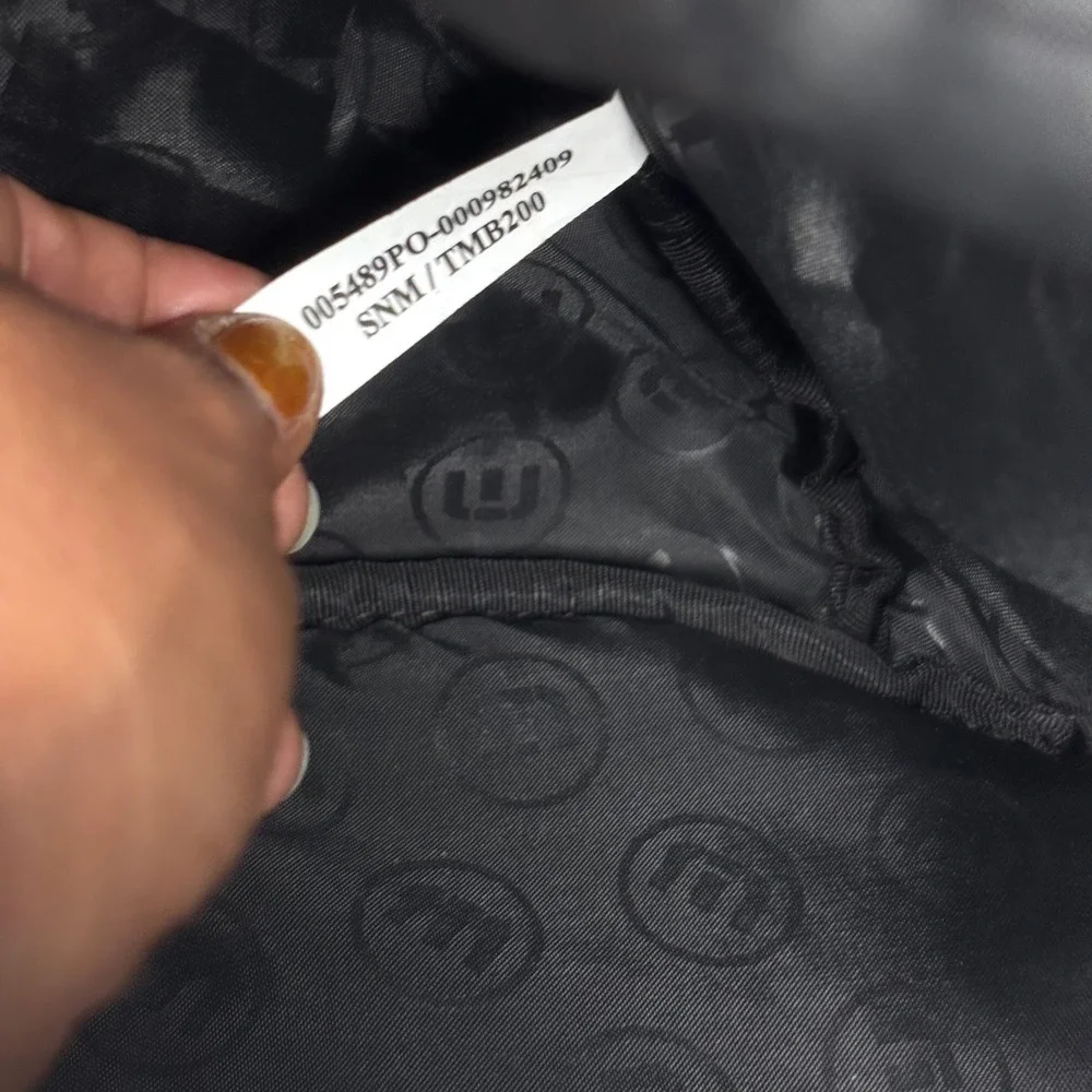 Travis Mathew some spray