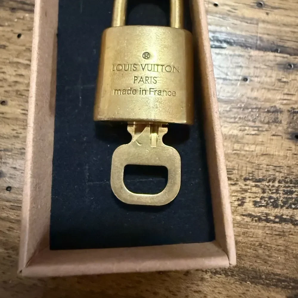 Louis Vuitton brass lock