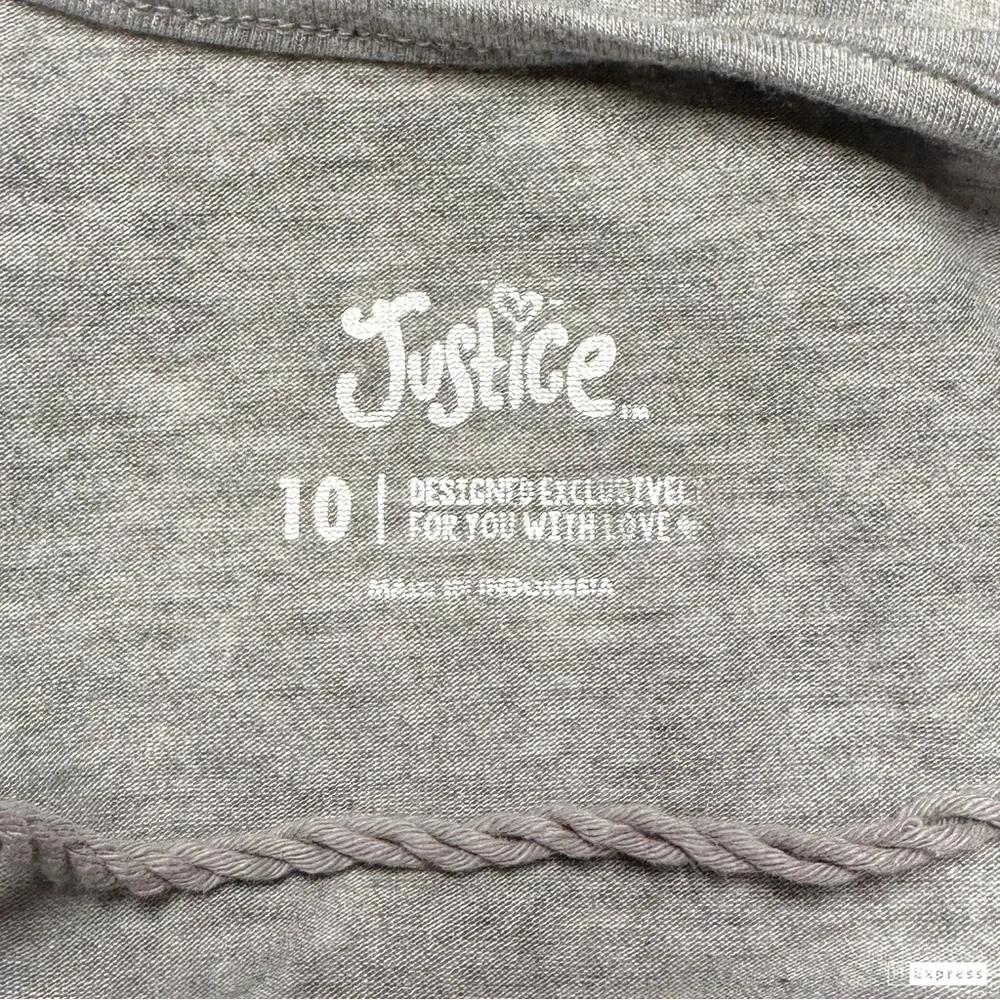 Justice Tassel Tie Neck Swing Jersey Top