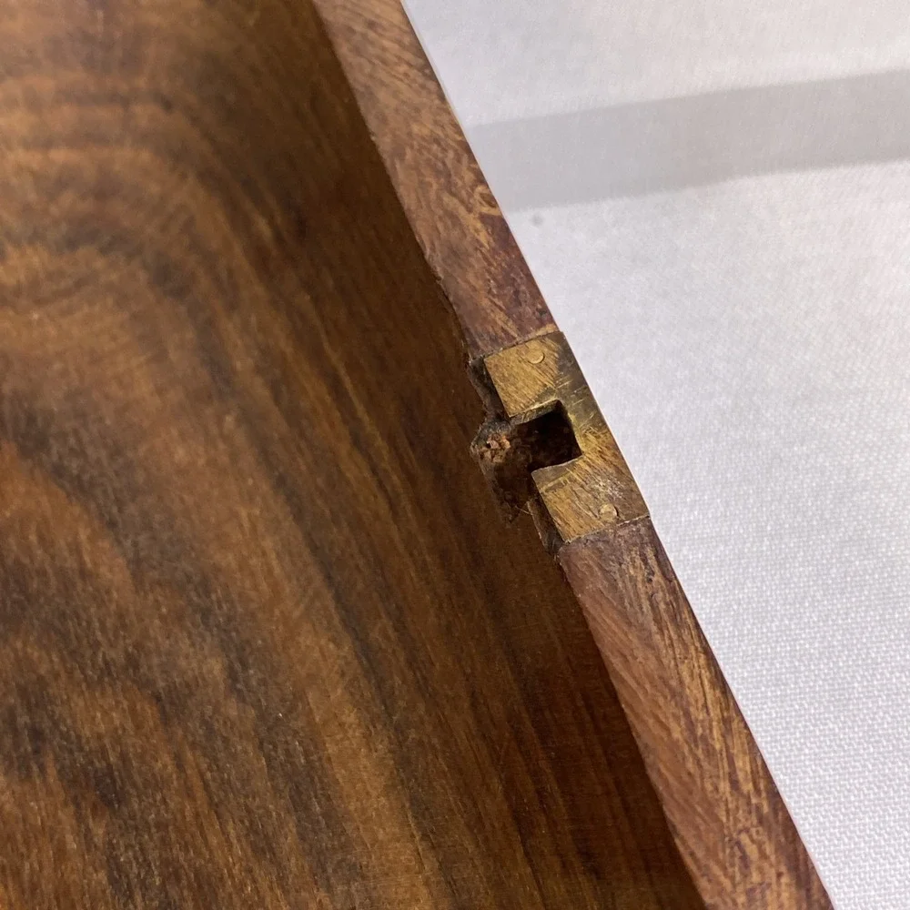 Hand carved 2 piece wood box with metal hinge, hook and metal ribs on lid