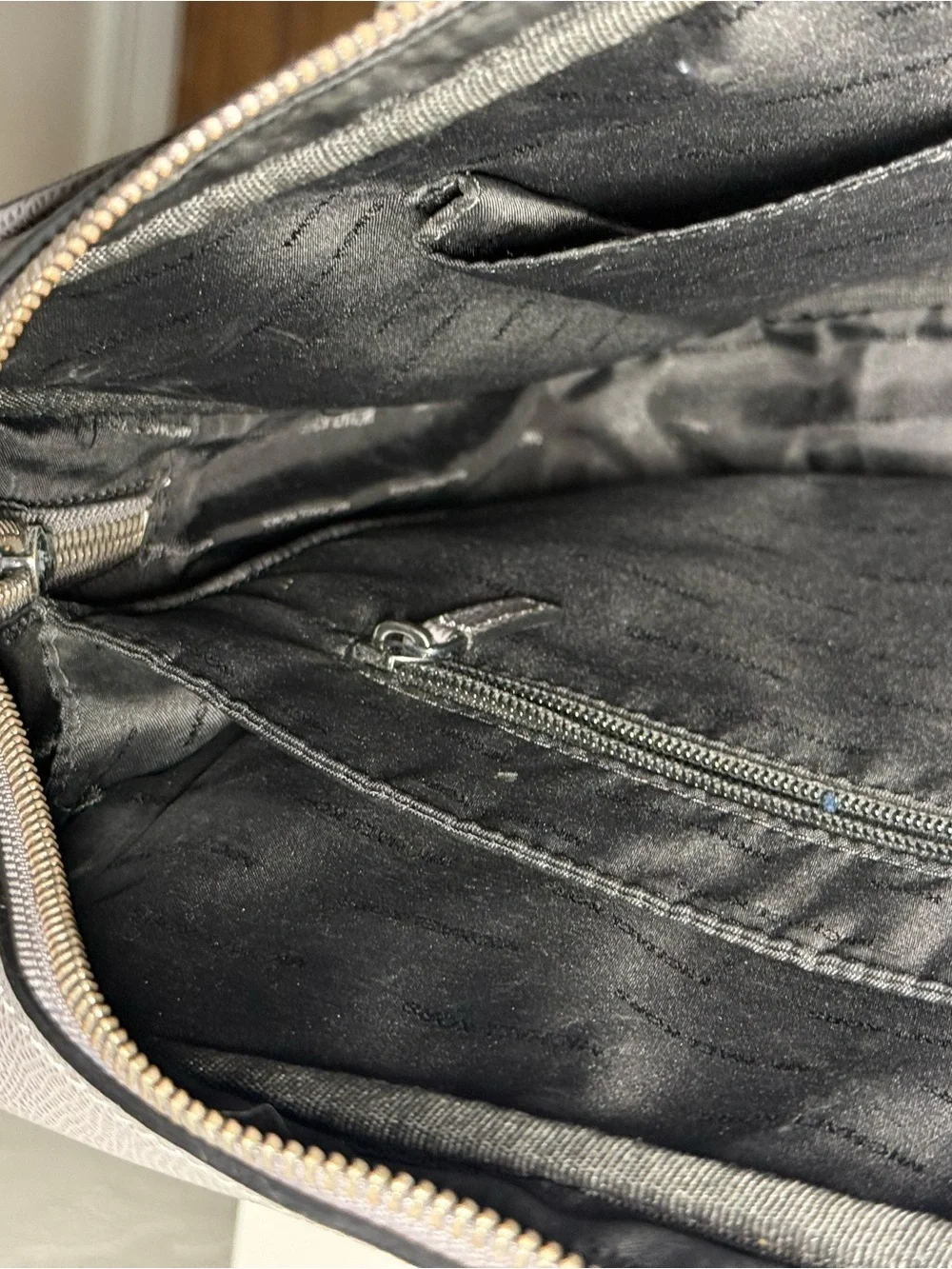 Michael Kors zip please