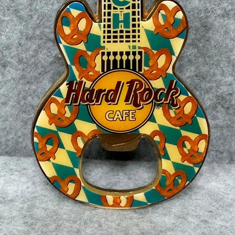 RARE Hard‎ Rock Cafe Munich Guitar Shaped Bottle Opener Pretzel Design