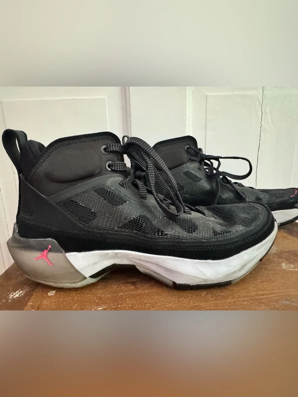 Boy’s Nike Air Jordan XXXVII Black Hot Punch basketball shoes.