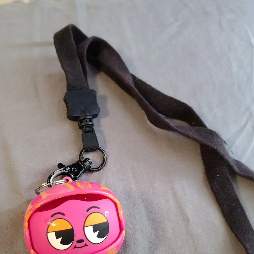 Pink Character Face Keychain Plastic Lanyard Modern Yellow Black Expressions