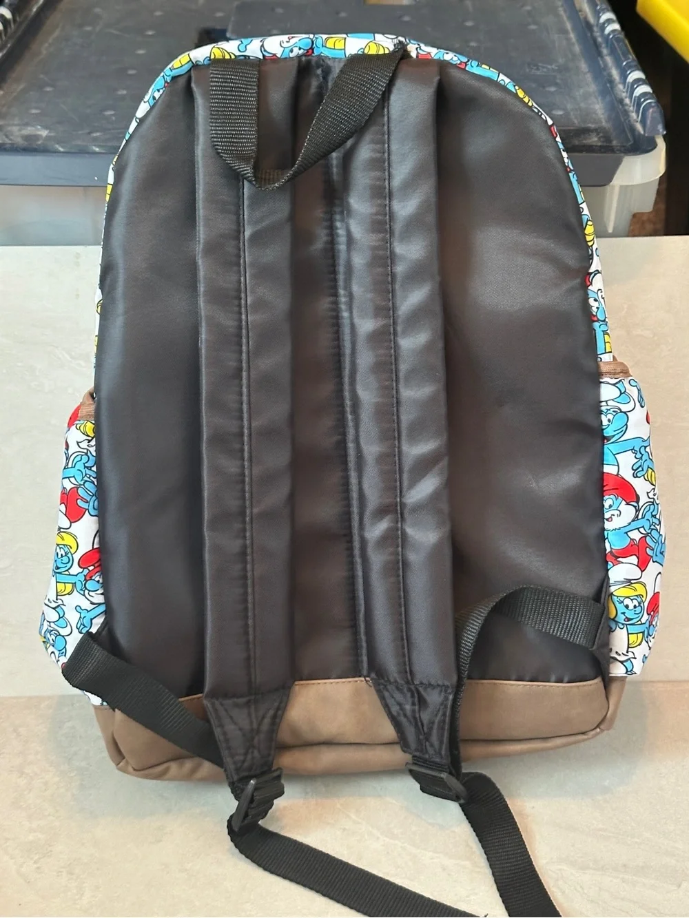 The Smurfs Backpack Allover Smurf Collage Design Laptop Pocket Front Pocket