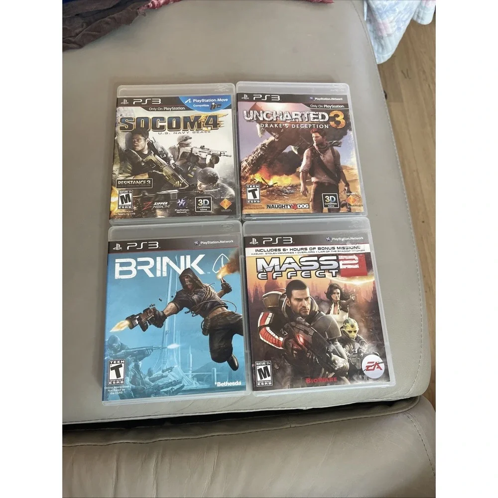 Lot of 4 Sony PS3 Games Brink Mass Effect 2 Uncharted 3 Socom 4 CIB