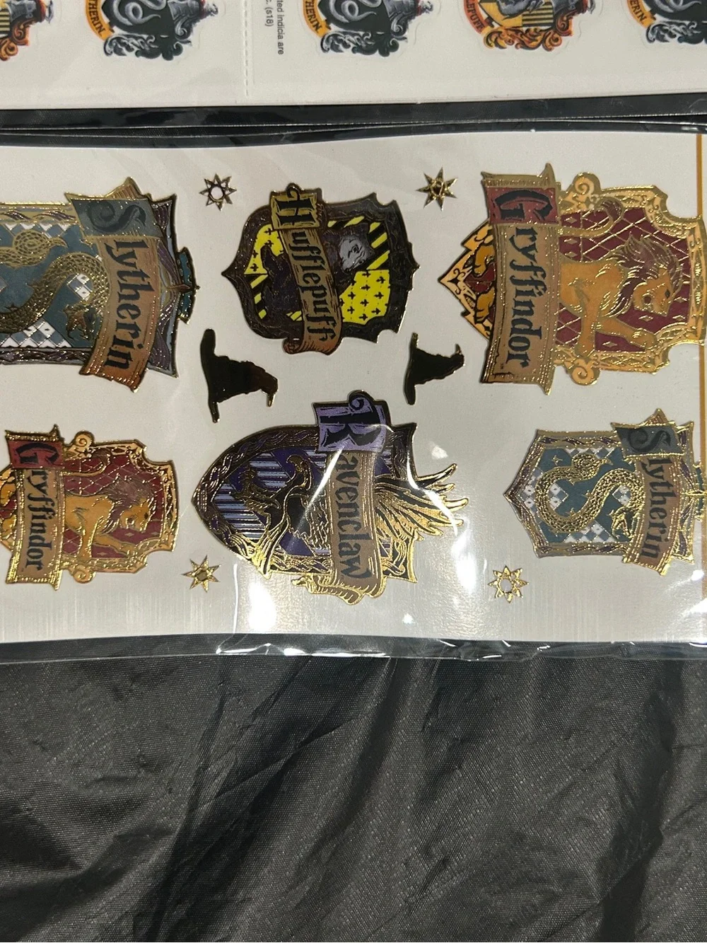Wizarding World Of Harry Potter gold crests