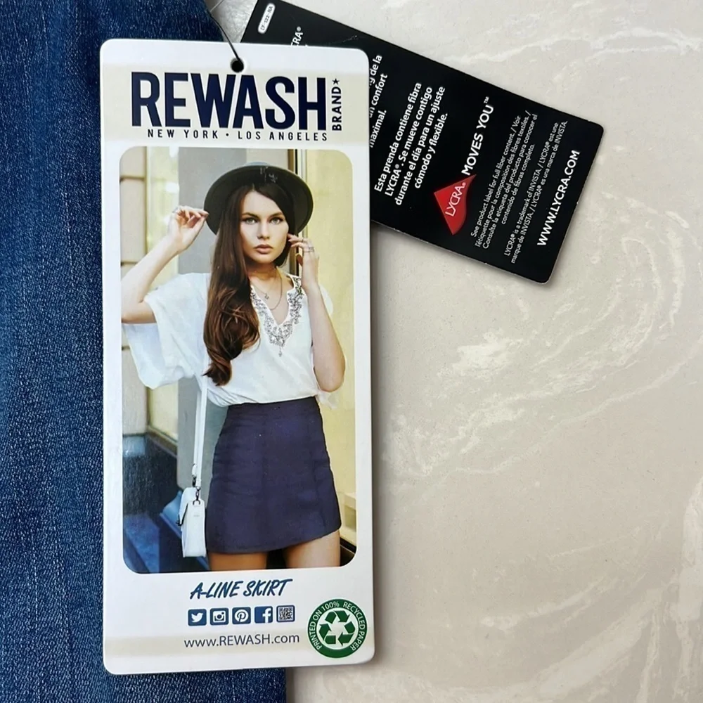 REWASH ultra stretch denim A-Line skirt there is a back zipper, size 9
