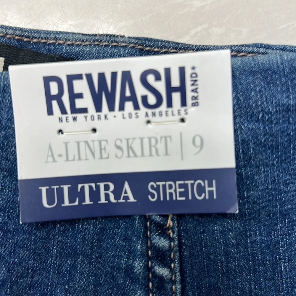 REWASH ultra stretch denim A-Line skirt there is a back zipper, size 9