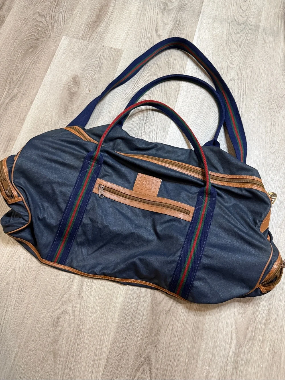Gucci Navy Duffel Bag with Tan Leather Trim and Red-Green Stripe Webbing
