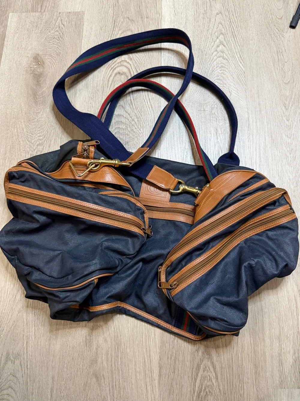Gucci Navy Duffel Bag with Tan Leather Trim and Red-Green Stripe Webbing