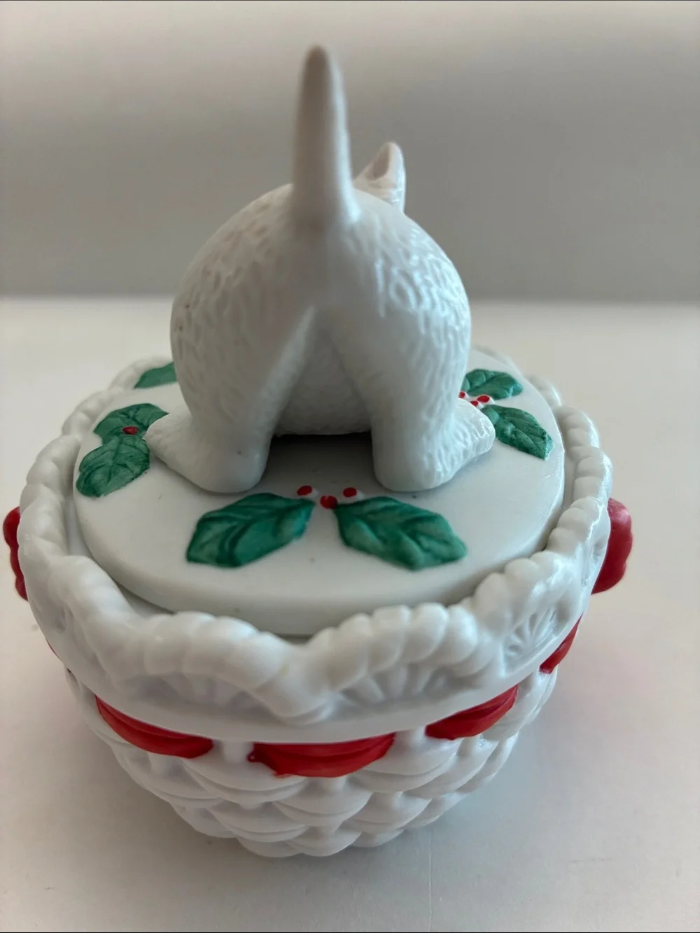 Lefton trinket atop original