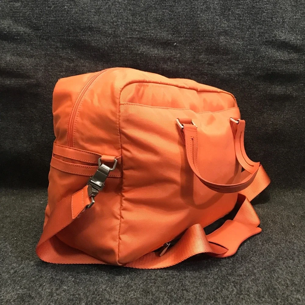 Tumi Model 4892MLN Voyageur Tangerine Nylon Weekender Travel Shoulder Duffel Bag