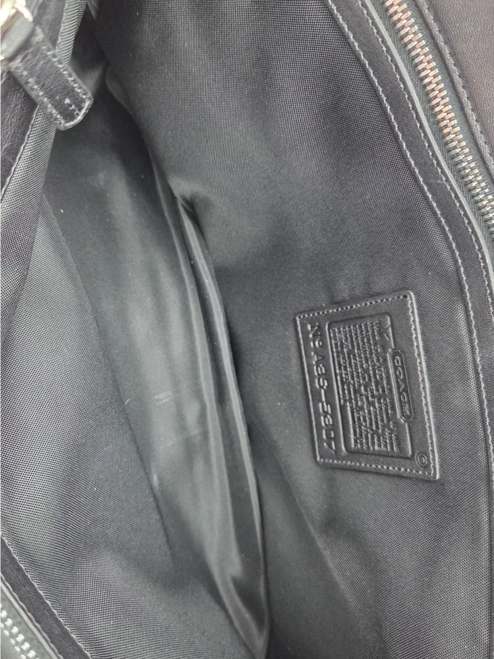 Coach sleek black