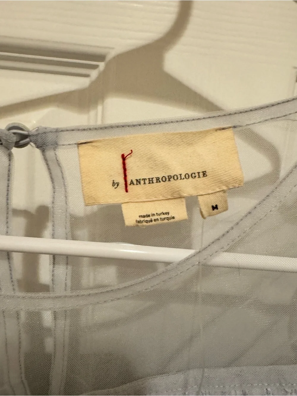 Anthropologie overlay silhouette down