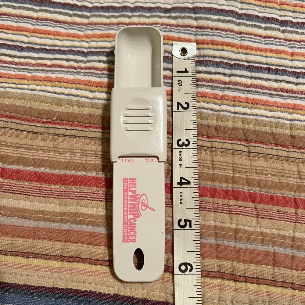The Pampered Chef adjustable measuring