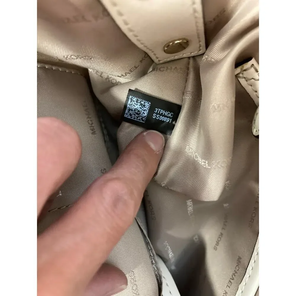 Michael Kors interor charm metal