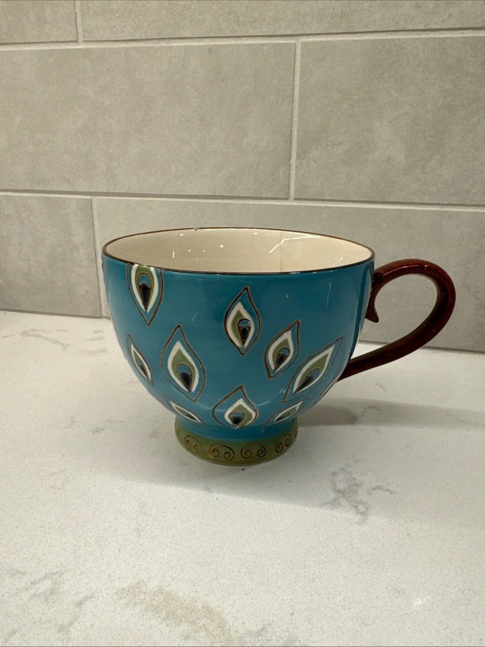 Pier 1 Turquoise Peacock Feather Ceramic Tea Cup with Brown Handle hand painted