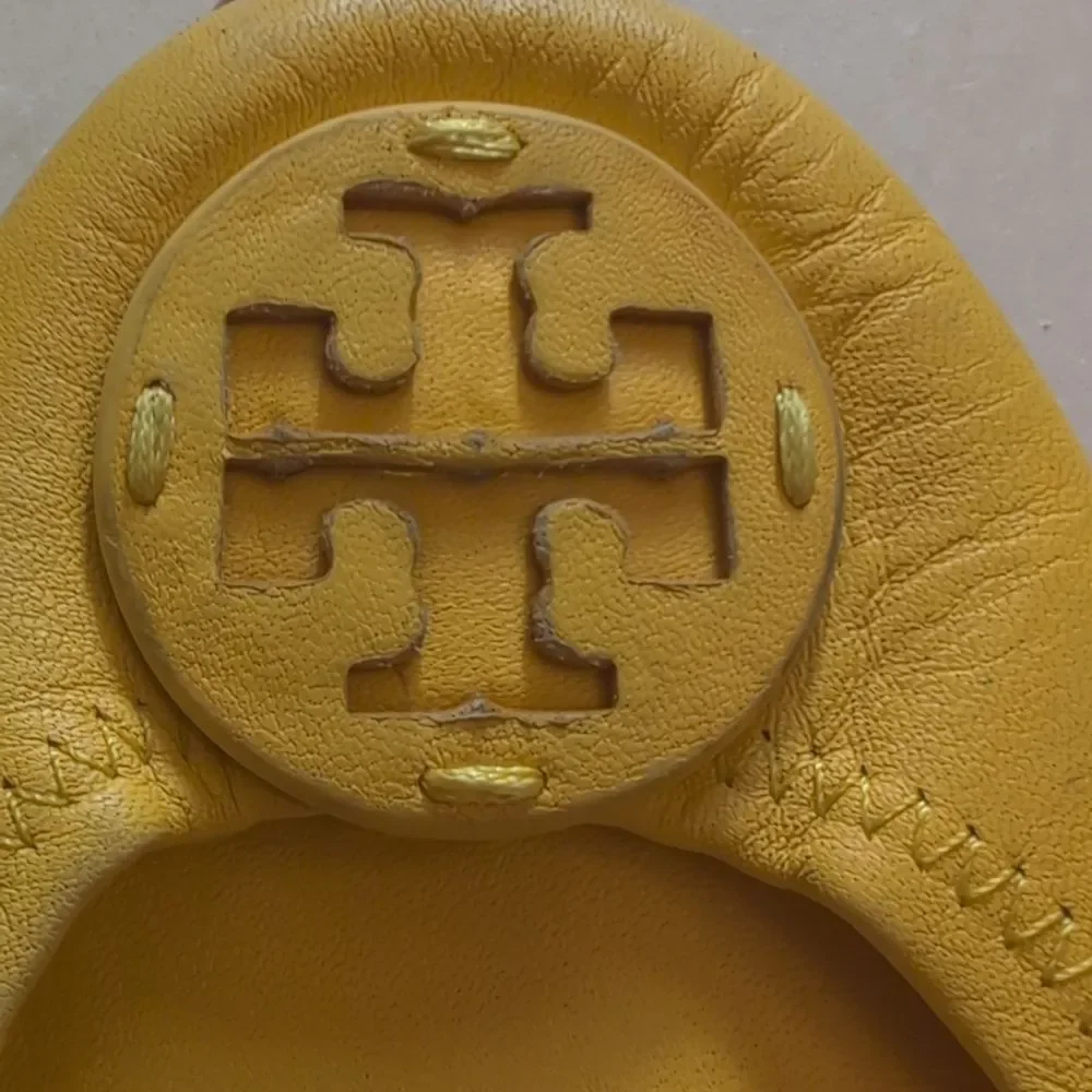 Tory Burch very worn