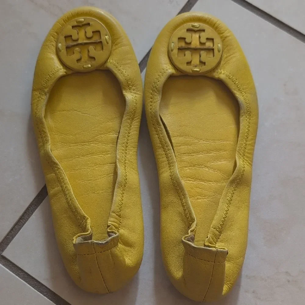 Tory Burch very worn