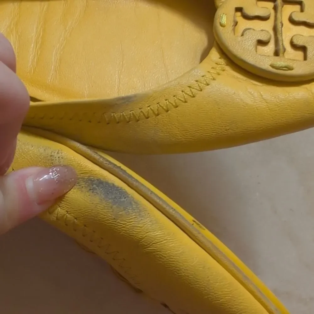 Tory Burch very worn