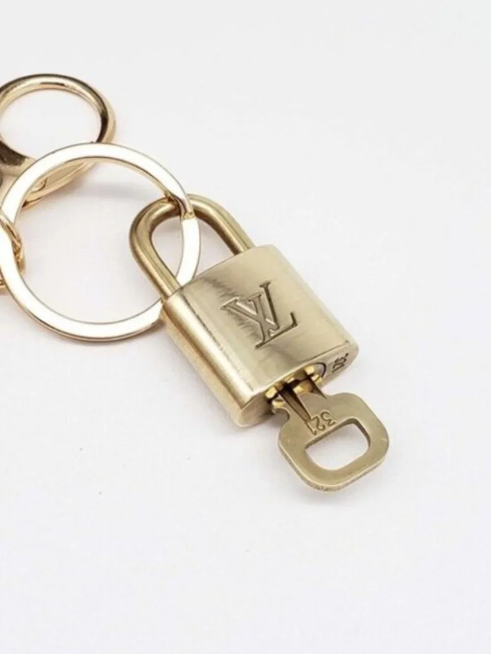 Louis Vuitton Authentic Gold Lock 🔒 Unbranded Apple Keychain Charm for Bags