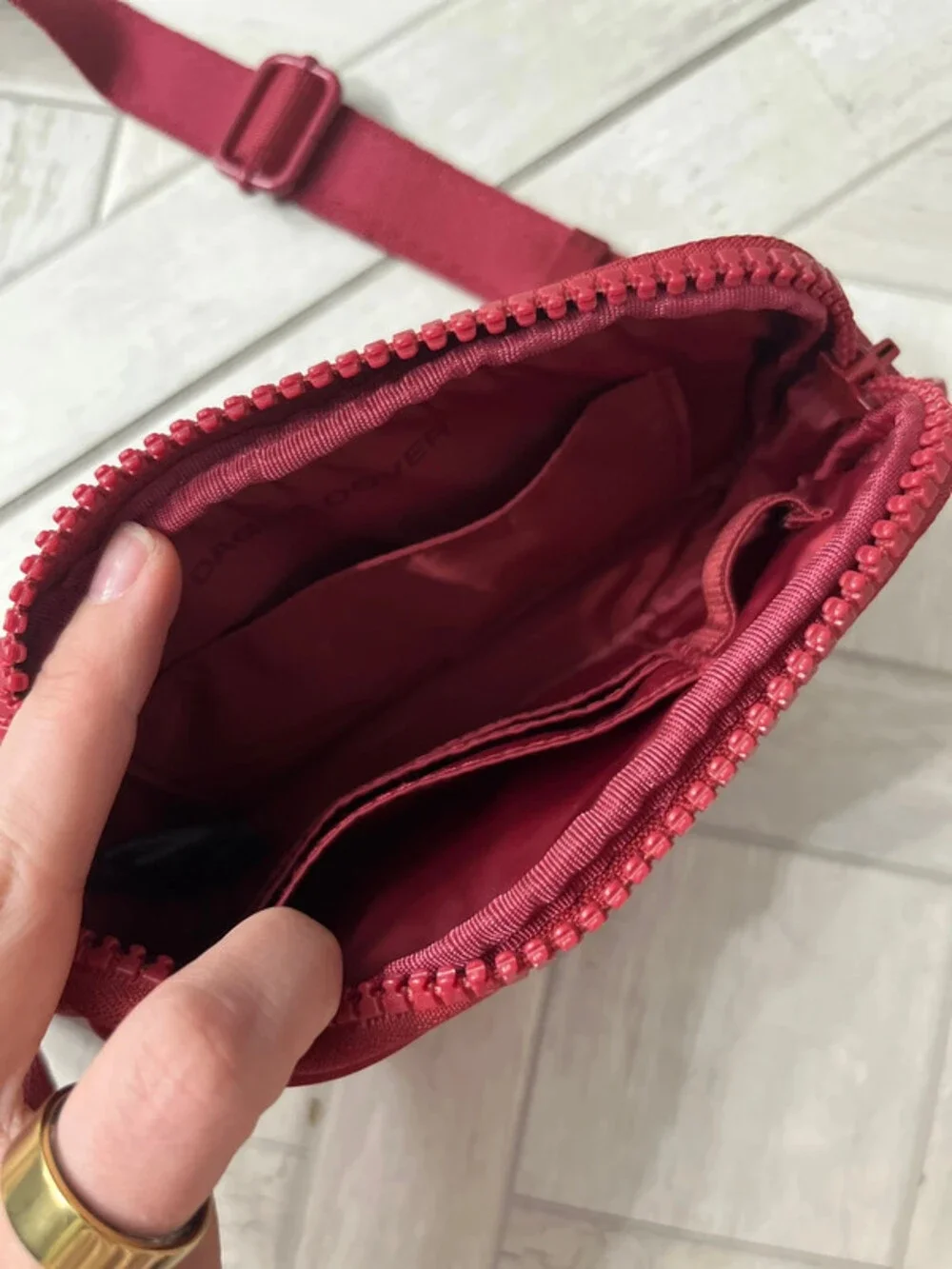 Dagne Dover Sephora colab bag. Burgundy crossbody with long strap brand new cond