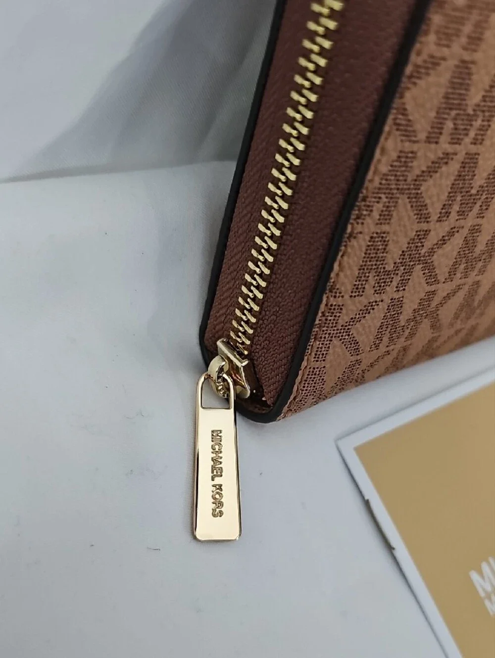 Michael Kors mk logo