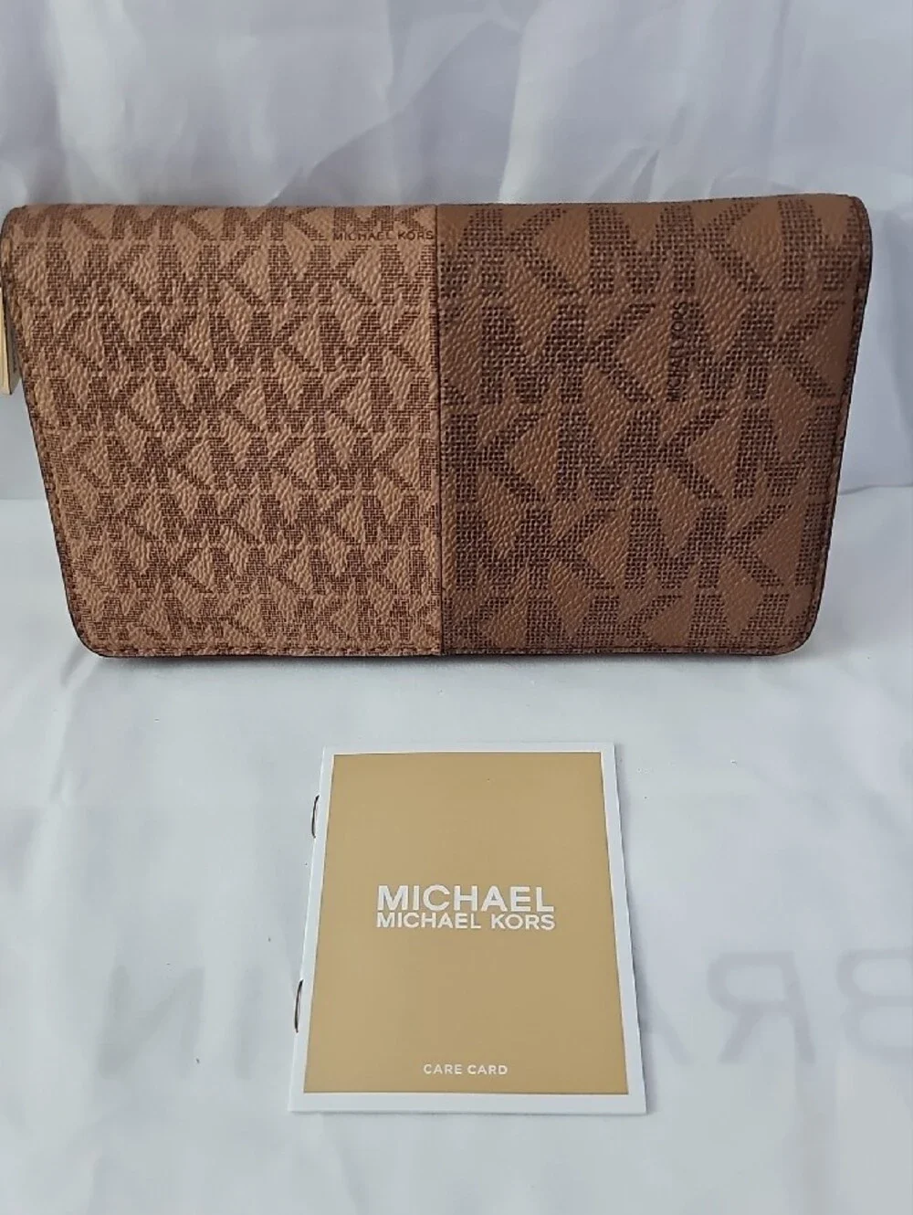 Michael Kors mk logo